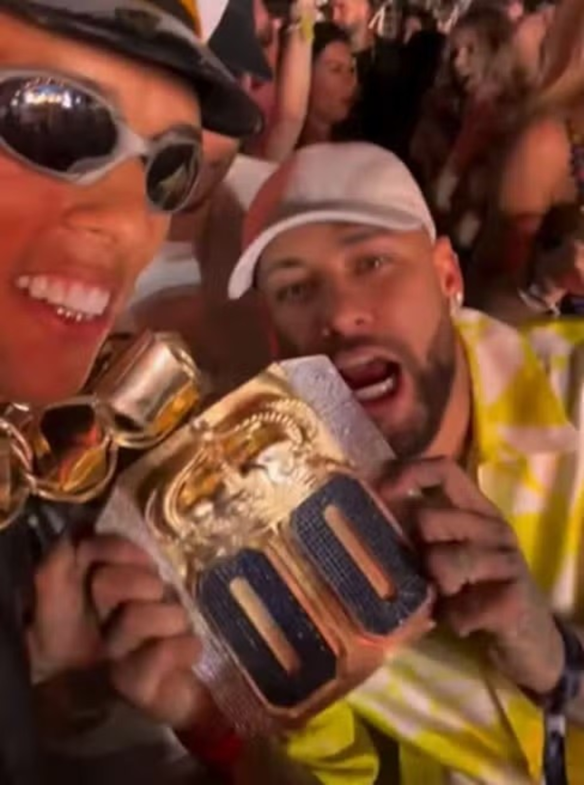 Buzeira poses next to Neymar Jr., claiming to have gifted the athlete a chain valued at R$ 2 million, undated. It led police to investigate a network of receivers of stolen wedding rings in Sao Paulo, Brazil. Note: Private photo. (Newsflash/NX)